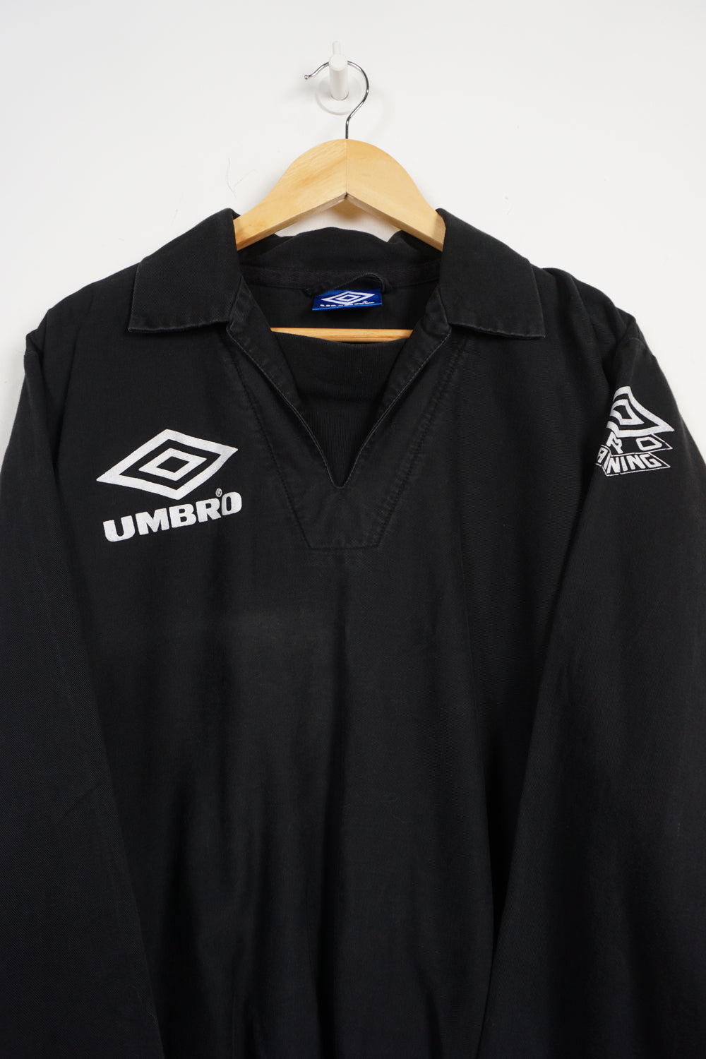 Vintage 90's Umbro Pro Training black cotton drill top with raised logos on the chest, sleeve and back