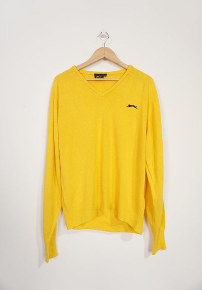 Vintage all yellow Slazenger v neck wool jumper with navy blue embroidered logo on the chest