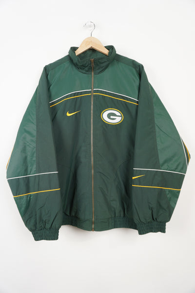 Vintage Nike Team NFL Pro Line Green Bay Packers jacket with embroidered badges on the front and back 