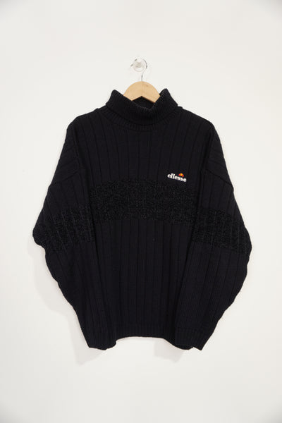 Vintage Ellesse high neck navy blue almost black jumper with embroidered logo on the chest