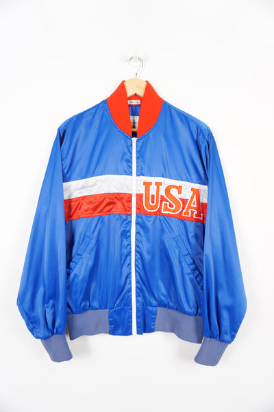 Vintage 1970's USA zip through lightweight jacket with embroidered badges on the chest. Brand in label - Twins Enterprise Inc. good condition Size in Label: L