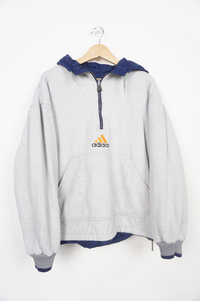 Adidas reversible hooded 1/4 zip jacket with embroidered logo on the front