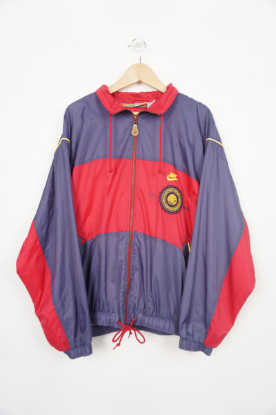 Vintage 90's Nike purple and red zip through shell jacket with embroidered logos on the chest and spell-out detail on the back