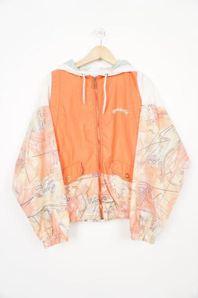 Vintage Reebok tangerine patterned zip through shell jacket with embroidered logo on the chest 