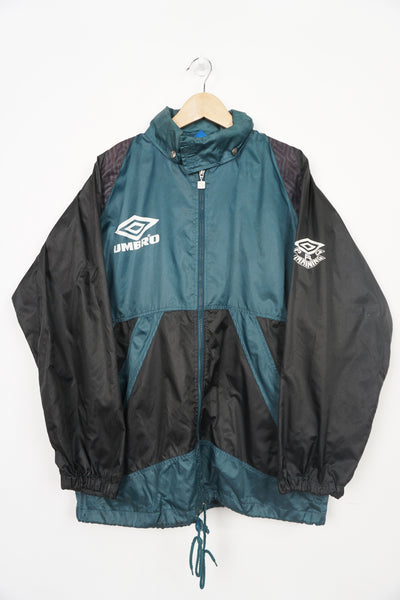 Umbro Pro Sport forest green lightweight jacket with printed logos on the chest and back