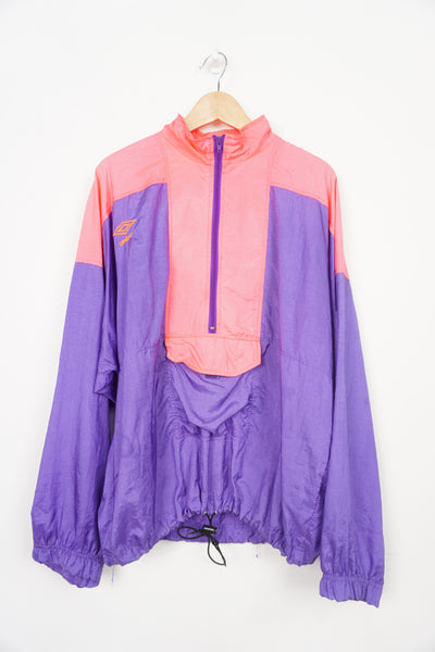 Vintage 90s Umbro Sand Soccer pink and purple 1/4 zip pullover jacket with embroidered logo on the chest and printed logo on the back