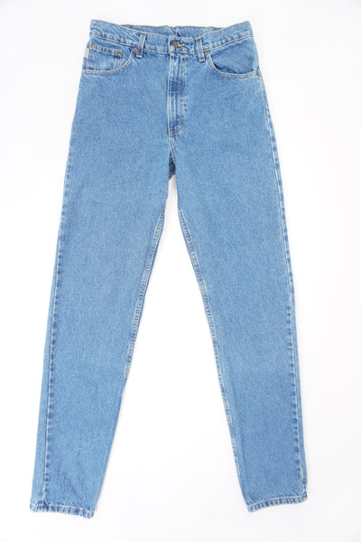 Carhartt traditional fit blue denim jeans with signature leather logo on the back pocket