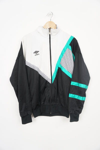 Vintage 90s Umbro black, white and green  zip through track jacket with embroidered logo on the chest 