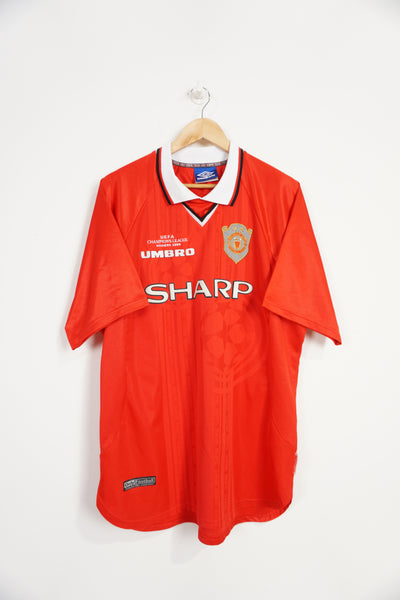 Vintage 1999 Manchester United F.C UEFA Champions League Winners football shirt. Gold reflective badge on chest along with embroidered, logos and raised sponsor. Good condition, few small pulls and small stain on collar Size in Label: XL