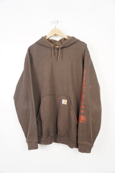 Carhartt forest light brown hoodie with branded pocket and spell-out detail on the sleeve