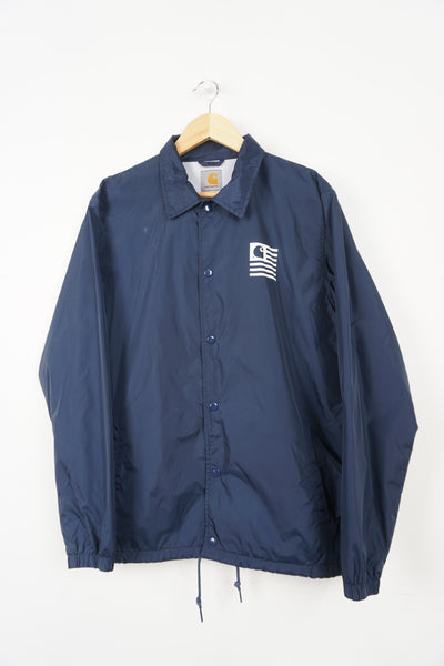 Navy blue button up Carhartt State Coach jacket with printed logo on the chest 