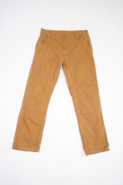 Dickies tan carpenter style jeans with multiple pockets and double knee