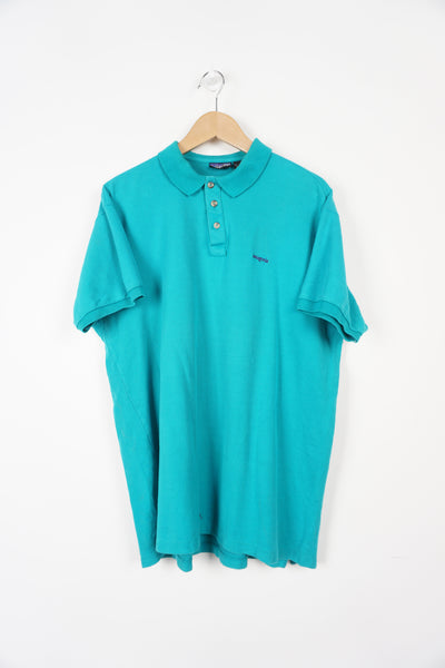 Patagonia teal blue polo shirt with embroidered logo on the chest