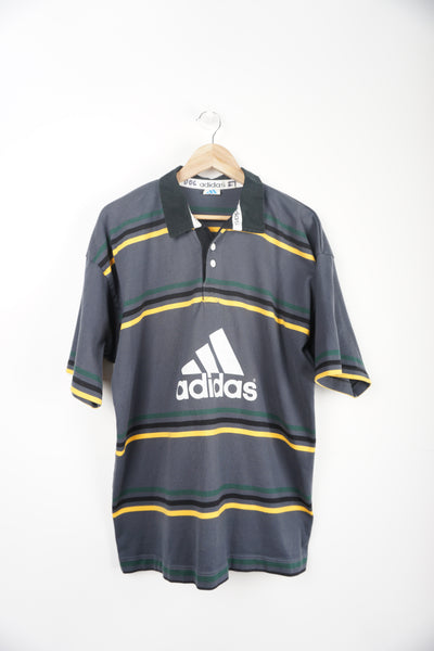 Vintage Adidas Grey Polo Shirt with green/black/yellow stripes and logo on chest Item in good condition, print cracking on chest logo Size in Label: XXL