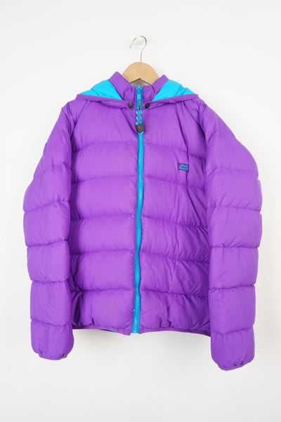 Mountain Equipment light line purple and blue reversible puffer jacket with and logo on front 