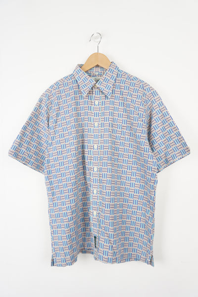Geometric stripe short sleeve shirt with embroidered Ben Sherman tag on the front pocket.