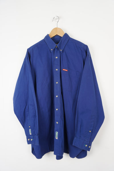 Royal blue Kickers long sleeve shirt. Has embroidered logo tag on the pocket hem and cuff.