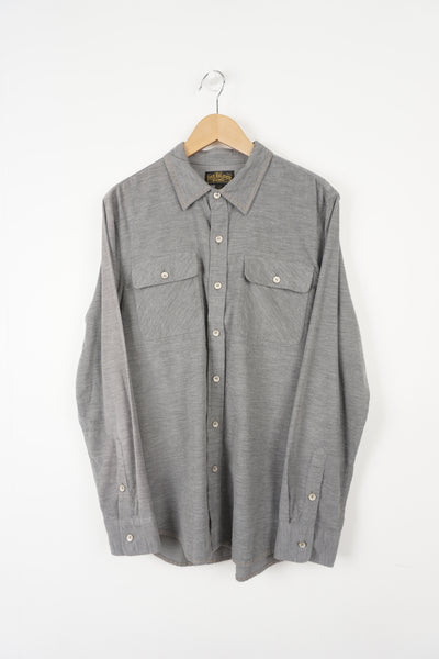 Grey cord shirt from True Religion. Features yellow contrast stitching along the collar