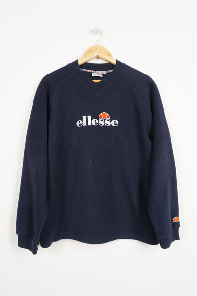 Navy Ellesse fleeced sweatshirt, embroidered logo&nbsp;across chest good condition, few small marks on front of jumper Size in Label: S