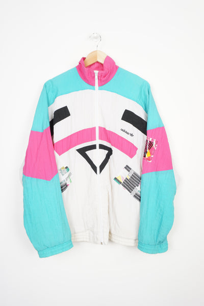 Vintage Adidas action wear full zip tracksuit top, with printed logo.