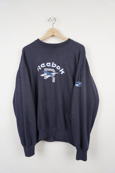 Reebok blue crewneck sweatshirt with  embroidered logo on the front