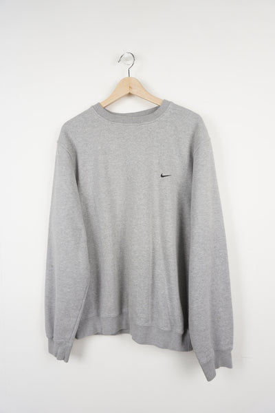 00s Nike grey crewneck sweatshirt with black embroidered swoosh detail on the front