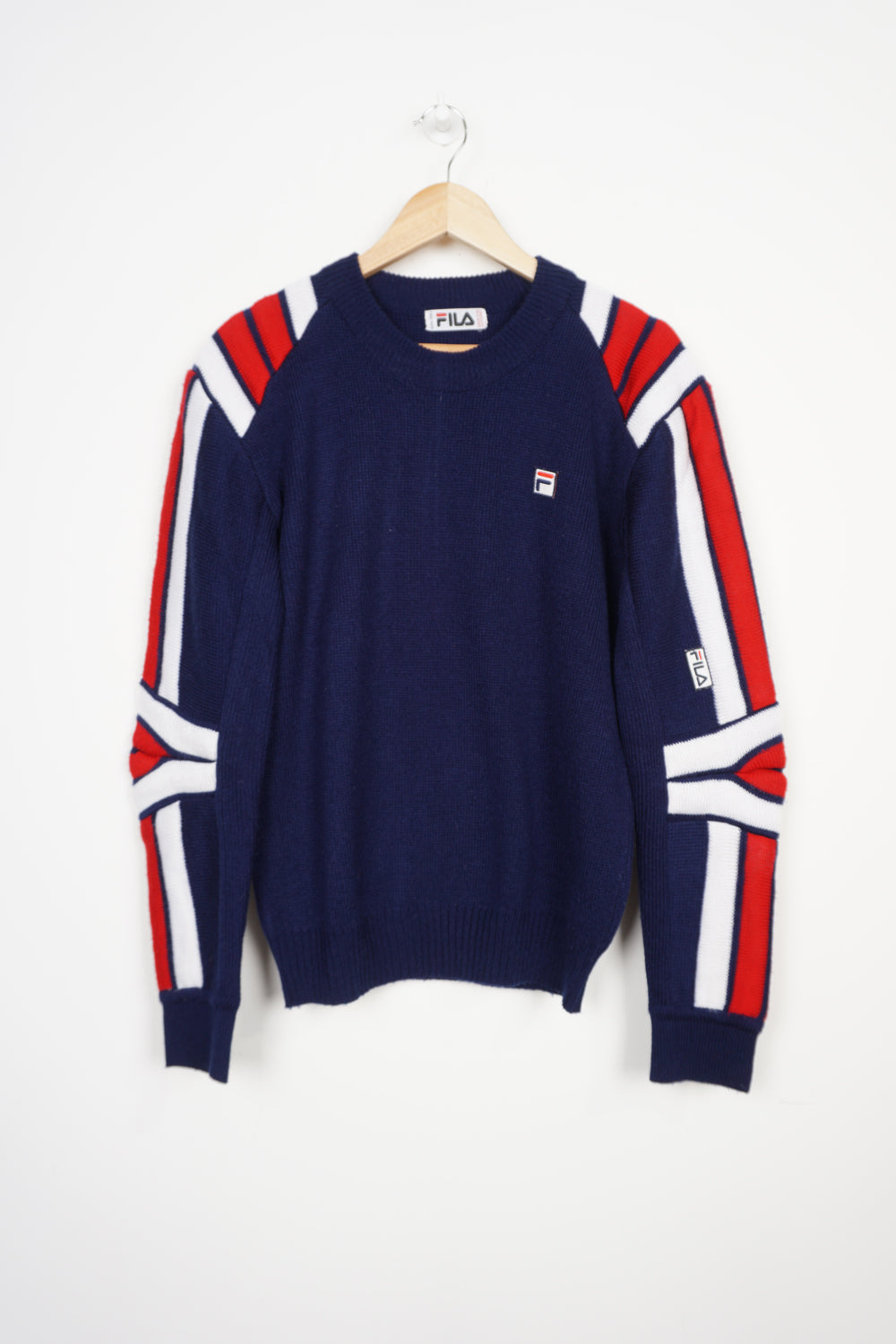 Vintage navy blue colour block Fila knit jumper with embroidered logo on the chest and padded details on the sleeve