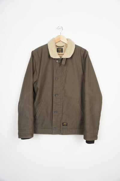 Khaki green heavy duty cotton Carhartt zip through jacket with fleece lining 
