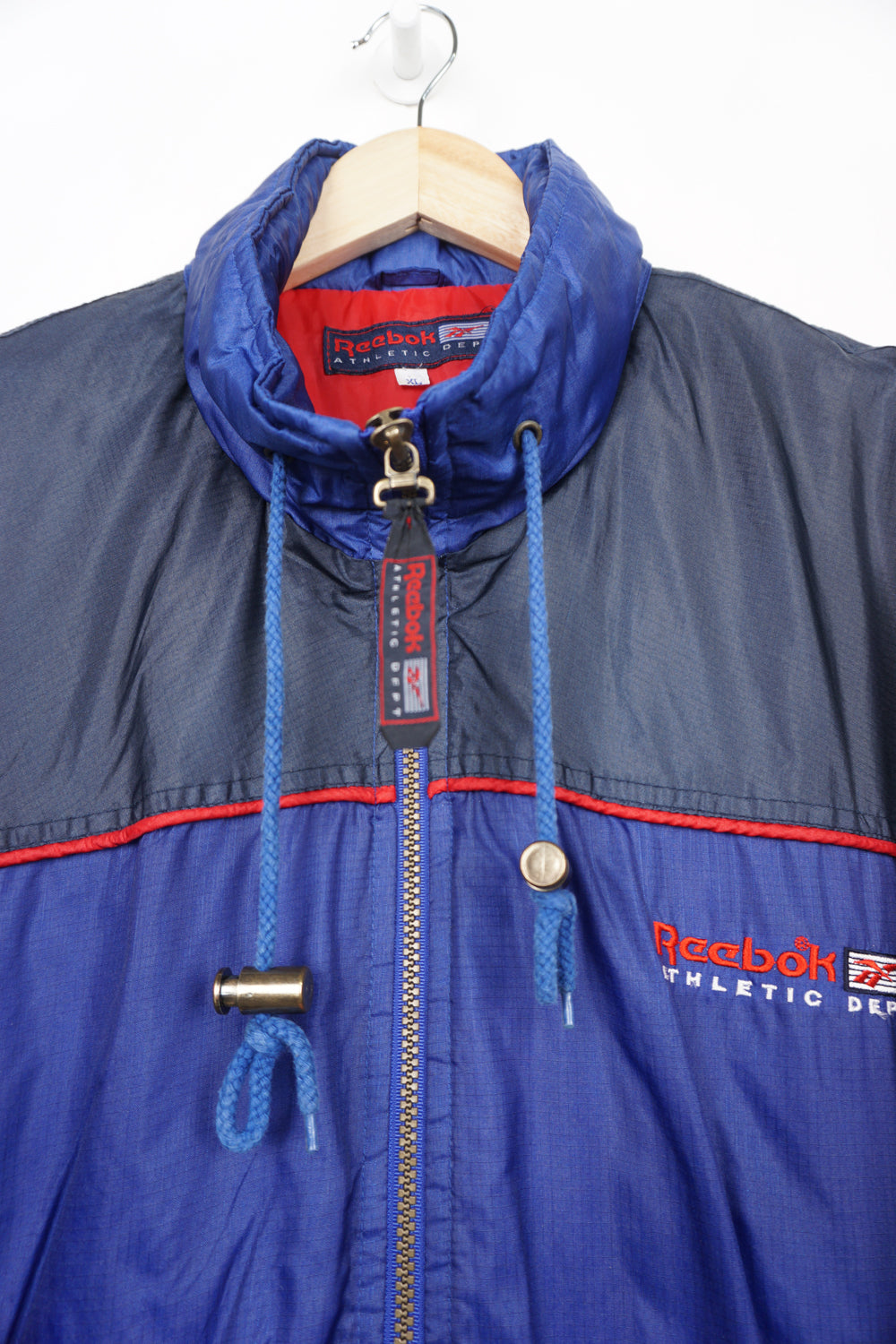 Navy Reebok winter coat with embroidered logo