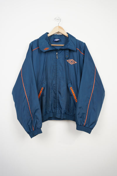 Vintage blue zip through Umbro coat with embroidered logo on the chest and foldaway hood 