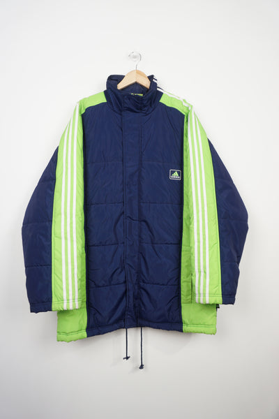 Vintage 90's blue and green Adidas sports coat, with embroidered logo on the chest, three stripes 