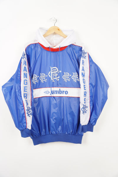 Vintage Umbro Glasgow Rangers blue and white pullover windbreaker with printed details and sponsor