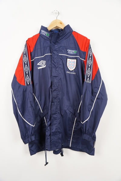 Vintage 1996/98 England training lightweight jacket by Umbro, ribbon details on the shoulders, foldaway hood and embroidered badge on the chest