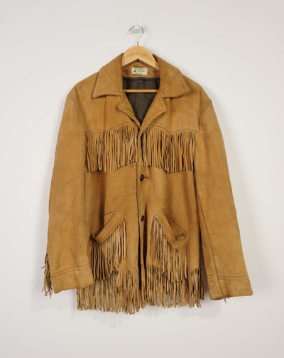 Vintage made in Mexico tan suede leather jacket with fringe details on the front and down both sleeves
