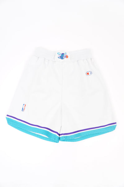 Vintage 90s Charlotte Hornets Champion basketball shorts with embroidered details