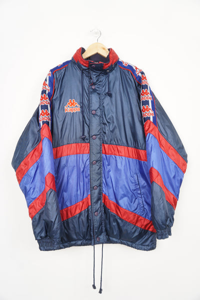 Vintage 90's Kappa coat in the Barcelona colour way with embroidered logo on the front and back and foldaway hood