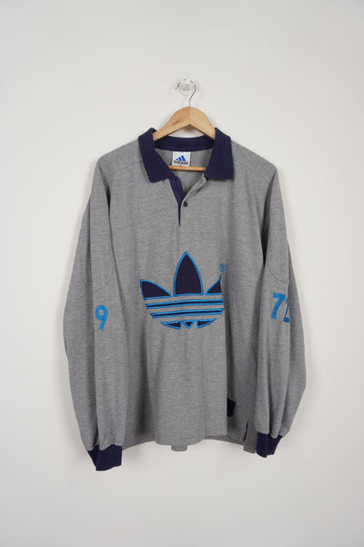 Vintage limited addition 1997 25 year anniversary Adidas grey sweatshirt with blue collar and embroidered logo on the front 
