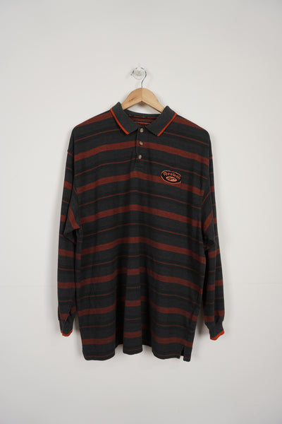 Vintage 90's dark grey and orange Reebok long sleeve polo shirt with embroidered logo