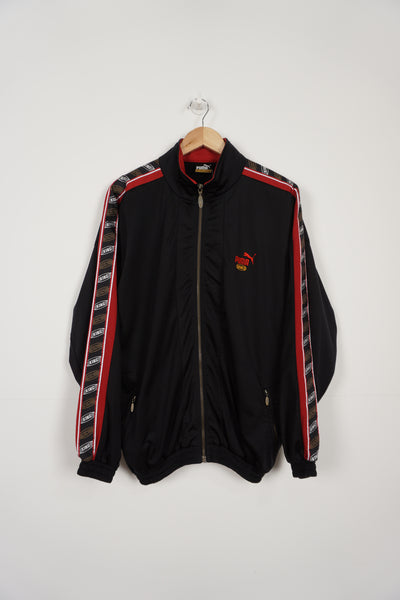 Vintage black and red customised 'Angel Baton Twizlers'  Puma King tracksuit jacket with ribbon down the sleeves and embroidered logo 