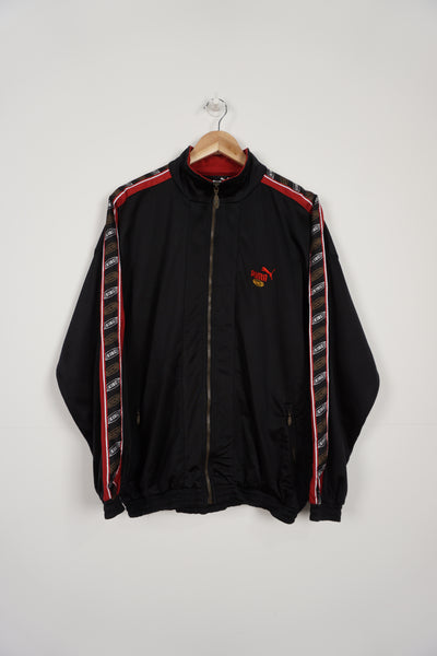 Vintage black and red Puma King tracksuit jacket with ribbon down the sleeves and embroidered logo 