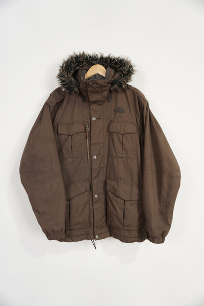 The North Face zip through brown outdoor jacket with faux fur round the hood and multiple pockets