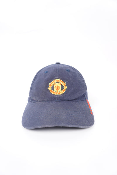 Navy blue Umbro x Manchester United baseball cap with embroidered logos on the front and back