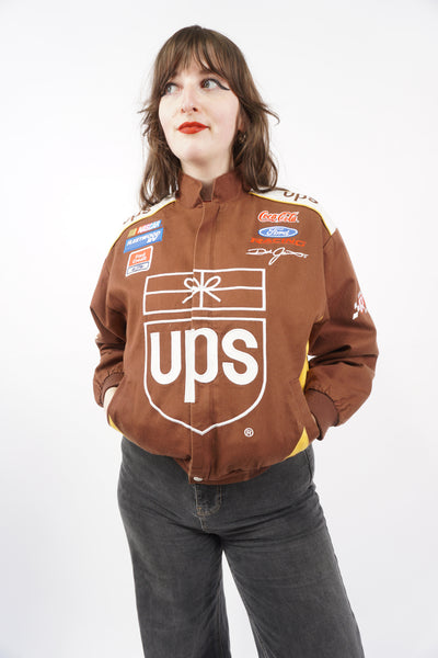 Vintage 90s Women's brown cotton UPS Nascar jacket by Chase Authentics. With embroidered details and sponsors all over