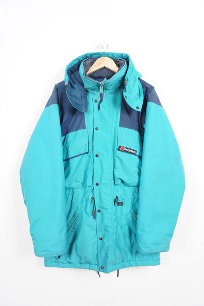 Vintage turquoise Berghaus, zip through Gortex waterproof, insulated coat with removable hood and embroidered logo on the chest