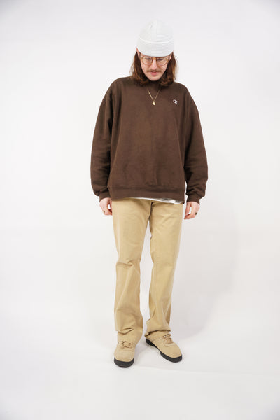 Light tan Camel Active, straight leg jeans with logo on the back pocket