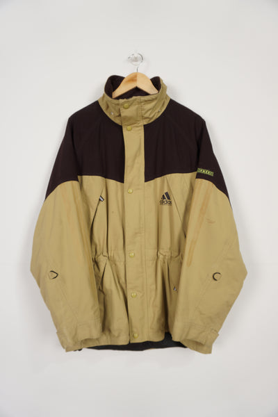 Vintage green Adidas Adventure Equipment jacket, with embroidered logo on the chest and detachable hood