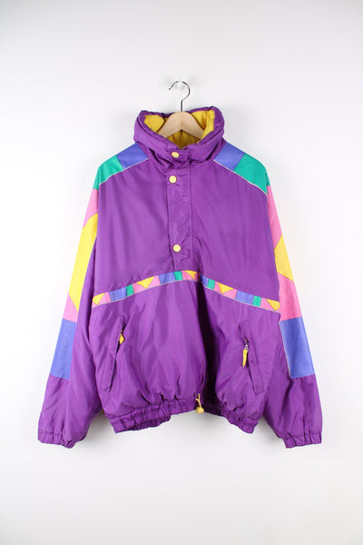 Purple Vintage Ellesse 80s pullover half zip coat. Features multi colored pattern panelling.