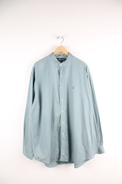 Ralph Lauren blue button up shirt with signature embroidered logo on the chest.