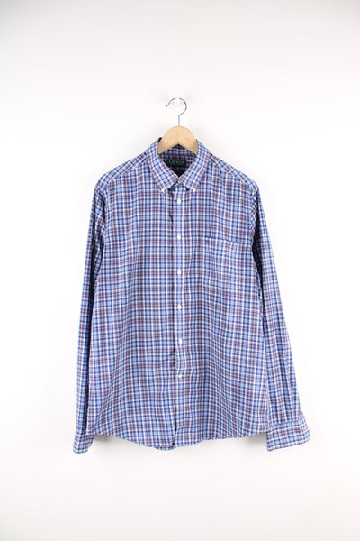 Ralph Lauren blue and red button up plaid shirt. Features pocket on the chest with an embroidered logo.