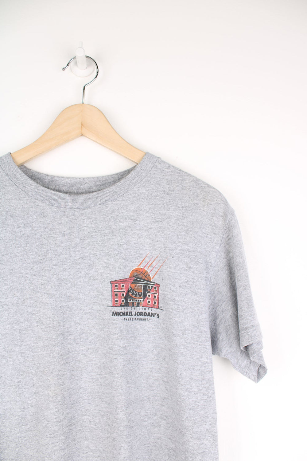 Vintage Nike Michael Jordan's The Restaurant T-Shirt. Features graphic print on the chest and back.